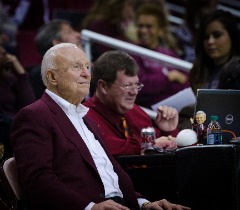 Bill Powers courtside at the New Mexico State-Chicago State basketball game next to legendary coach Lou Henson. Powers was the SID at New Mexico State when Henson was inducted into the National Collegiate Basketball Hall of Fame.